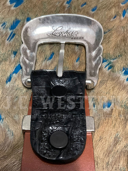 Lucchese W9401 ULTRA BELLY CAIMAN Western Belt Black back of buckle close up. If you need any assistance with this item or the purchase of this item please call us at five six one seven four eight eight eight zero one Monday through Saturday 10:00a.m EST to 8:00 p.m EST