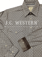 Panhandle RMN2S02812 Mens Long Sleeve Snap Western Shirt Brown close up view of contrast cuff, collar and pocket. If you need any assistance with this item or the purchase of this item please call us at five six one seven four eight eight eight zero one Monday through Saturday 10:00a.m EST to 8:00 p.m EST