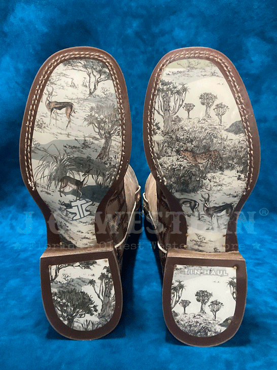 Tin Haul 14-021-0007-1512 Womens Chetah Chick Square Toe Western Boot Tan sole view of pair. If you need any assistance with this item or the purchase of this item please call us at five six one seven four eight eight eight zero one Monday through Saturday 10:00a.m EST to 8:00 p.m EST