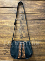 Nocona N770010501 Womens Stacey Style Conceal Carry Bucket Purse Black front view hanging. If you need any assistance with this item or the purchase of this item please call us at five six one seven four eight eight eight zero one Monday through Saturday 10:00a.m EST to 8:00 p.m EST