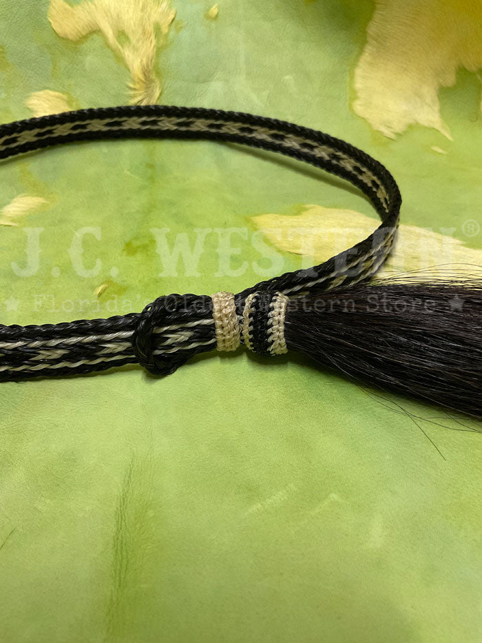 Fashionwest HH05TT-2 Horse Hair Hatband Black close up on hat. If you need any assistance with this item or the purchase of this item please call us at five six one seven four eight eight eight zero one Monday through Saturday 10:00a.m EST to 8:00 p.m EST