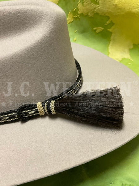 Fashionwest HH05TT-2 Horse Hair Hatband Black close up on hat. If you need any assistance with this item or the purchase of this item please call us at five six one seven four eight eight eight zero one Monday through Saturday 10:00a.m EST to 8:00 p.m EST