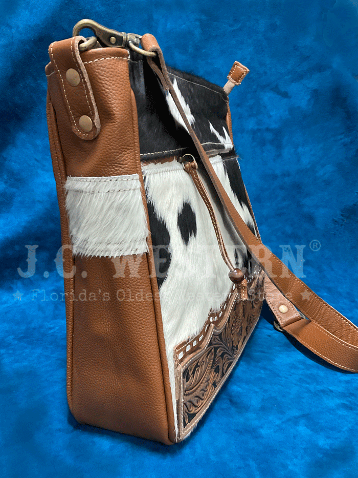 Myra Bag S-5189 Womens Genetic Hand-Tooled Hairon Bag Tan front view standing. If you need any assistance with this item or the purchase of this item please call us at five six one seven four eight eight eight zero one Monday through Saturday 10:00a.m EST to 8:00 p.m EST