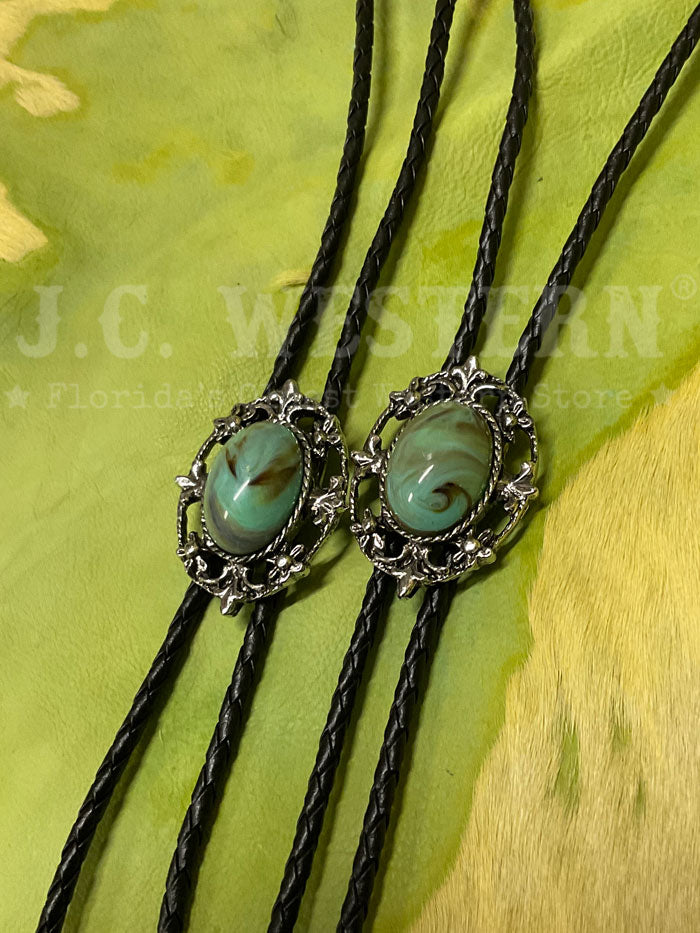 Fashionwest 1149T Western Bolo Tie Turquoise front view close up. If you need any assistance with this item or the purchase of this item please call us at five six one seven four eight eight eight zero one Monday through Saturday 10:00a.m EST to 8:00 p.m EST