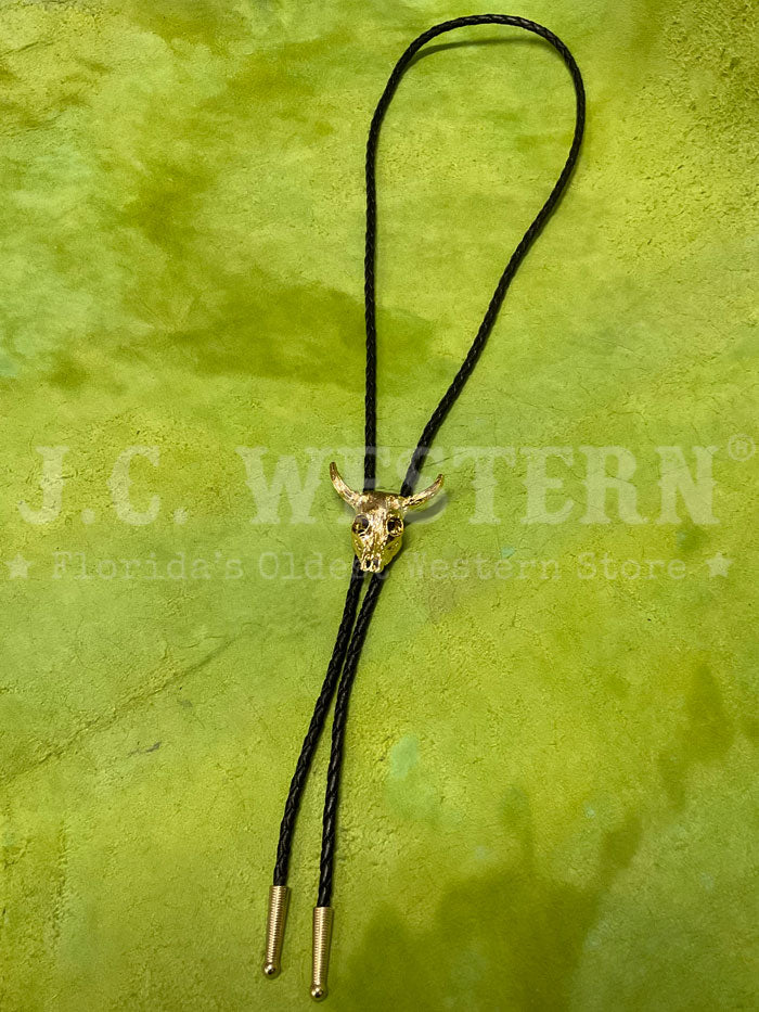 Fashionwest 1101G Skull Western Bolo Tie Gold front view close up. If you need any assistance with this item or the purchase of this item please call us at five six one seven four eight eight eight zero one Monday through Saturday 10:00a.m EST to 8:00 p.m EST