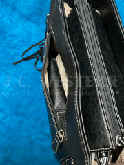 Nocona N770007901 Womens Norma Conceal Carry Satchel Sunflower Black conceal carry pocket view. If you need any assistance with this item or the purchase of this item please call us at five six one seven four eight eight eight zero one Monday through Saturday 10:00a.m EST to 8:00 p.m EST