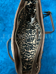 Ariat A770008102 Womens Calf Hair Patchwork Savannah Collection Messenger Bag Brown inside view. If you need any assistance with this item or the purchase of this item please call us at five six one seven four eight eight eight zero one Monday through Saturday 10:00a.m EST to 8:00 p.m EST