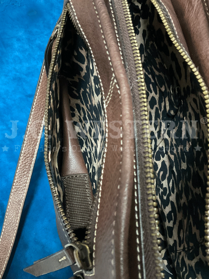 Ariat A770008102 Womens Calf Hair Patchwork Savannah Collection Messenger Bag Brown front view. If you need any assistance with this item or the purchase of this item please call us at five six one seven four eight eight eight zero one Monday through Saturday 10:00a.m EST to 8:00 p.m EST