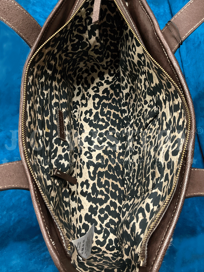 Ariat A770008002 Womens Calf Hair Patchwork Savannah Collection Tote Brown front view. If you need any assistance with this item or the purchase of this item please call us at five six one seven four eight eight eight zero one Monday through Saturday 10:00a.m EST to 8:00 p.m EST