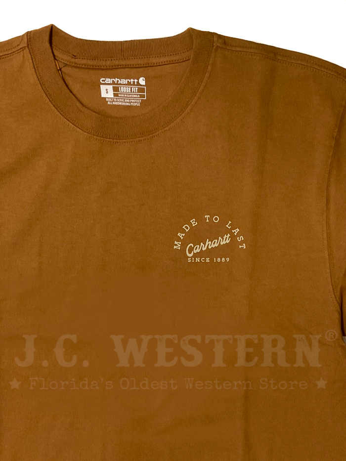 Carhartt 106153-BRN Mens Loose Fit Heavyweight Anvil Graphic T-Shirt Brown back view. If you need any assistance with this item or the purchase of this item please call us at five six one seven four eight eight eight zero one Monday through Saturday 10:00a.m EST to 8:00 p.m EST