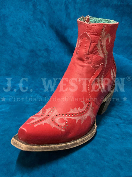 Corral G1379 Ladies Laser Ankle Boot Red side / front view. If you need any assistance with this item or the purchase of this item please call us at five six one seven four eight eight eight zero one Monday through Saturday 10:00a.m EST to 8:00 p.m EST