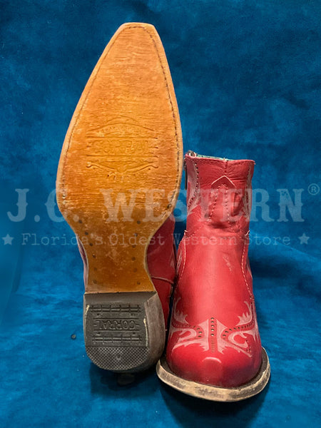 Corral G1379 Ladies Laser Ankle Boot Red sole and front view. If you need any assistance with this item or the purchase of this item please call us at five six one seven four eight eight eight zero one Monday through Saturday 10:00a.m EST to 8:00 p.m EST
