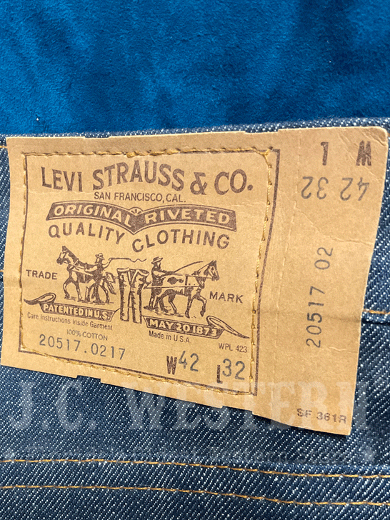 Levi's 20517-0217 Mens Vintage 517 Rigid Made in USA Jean Navy Blue 42x32 label close up. If you need any assistance with this item or the purchase of this item please call us at five six one seven four eight eight eight zero one Monday through Saturday 10:00a.m EST to 8:00 p.m EST