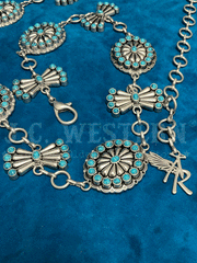 Angel Ranch D140007833 Ladies Oval Butterfly Conchos Chain Belt Turquoise close up. If you need any assistance with this item or the purchase of this item please call us at five six one seven four eight eight eight zero one Monday through Saturday 10:00a.m EST to 8:00 p.m EST