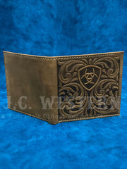 Ariat A3561444 Mens Large Bifold Scrolling Embossed Wallet Medium Brown Bark front view. If you need any assistance with this item or the purchase of this item please call us at five six one seven four eight eight eight zero one Monday through Saturday 10:00a.m EST to 8:00 p.m EST