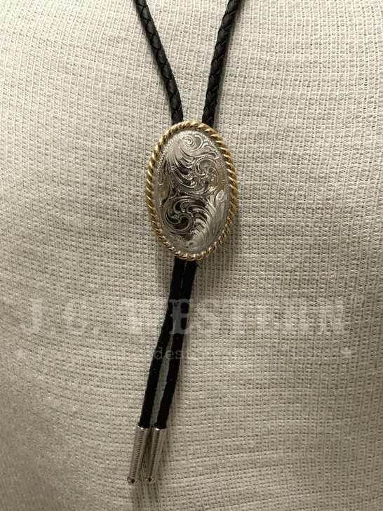 Crumrine C10850 Oval Concho Bolo Tie Silver front. If you need any assistance with this item or the purchase of this item please call us at five six one seven four eight eight eight zero one Monday through Saturday 10:00a.m EST to 8:00 p.m EST