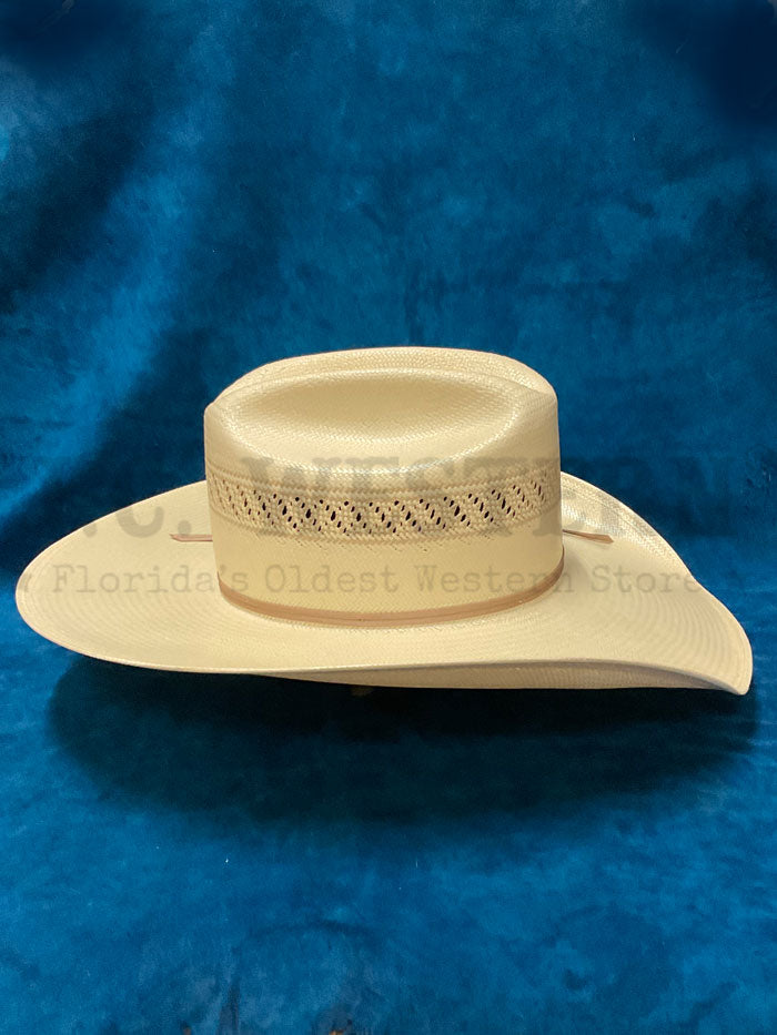 Resistol RSWIFI-684296 WILDFIRE REG Straw Hat Natural Tan side / front view. If you need any assistance with this item or the purchase of this item please call us at five six one seven four eight eight eight zero one Monday through Saturday 10:00a.m EST to 8:00 p.m EST