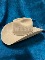 Stetson SFTRGY-754220 TRILOGY 6X Western Hat Stone side front view. If you need any assistance with this item or the purchase of this item please call us at five six one seven four eight eight eight zero one Monday through Saturday 10:00a.m EST to 8:00 p.m EST