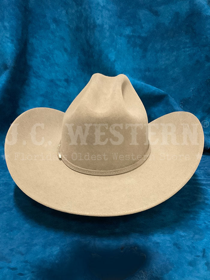 Stetson SFTRGY-754220 TRILOGY 6X Western Hat Stone side front view. If you need any assistance with this item or the purchase of this item please call us at five six one seven four eight eight eight zero one Monday through Saturday 10:00a.m EST to 8:00 p.m EST