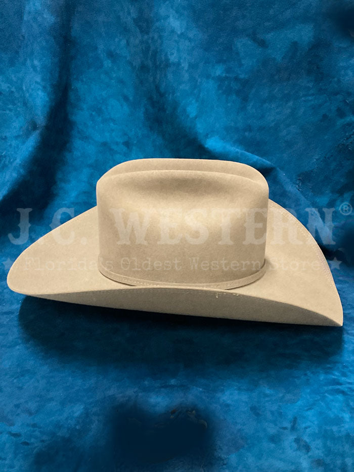 Stetson SFTRGY-754220 TRILOGY 6X Western Hat Stone side front view. If you need any assistance with this item or the purchase of this item please call us at five six one seven four eight eight eight zero one Monday through Saturday 10:00a.m EST to 8:00 p.m EST