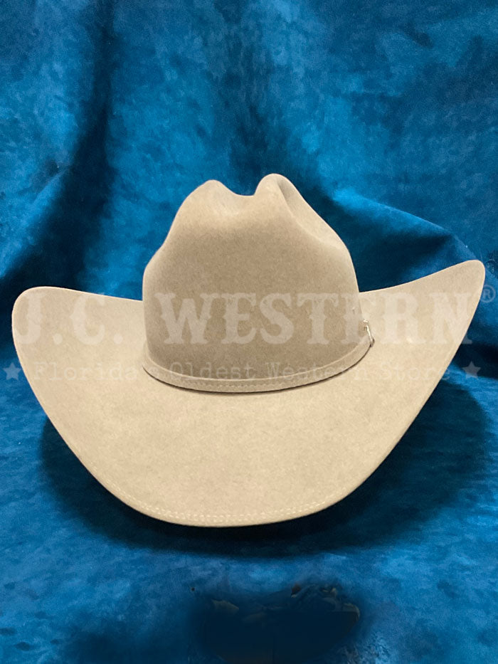 Stetson SFTRGY-754220 TRILOGY 6X Western Hat Stone side front view. If you need any assistance with this item or the purchase of this item please call us at five six one seven four eight eight eight zero one Monday through Saturday 10:00a.m EST to 8:00 p.m EST