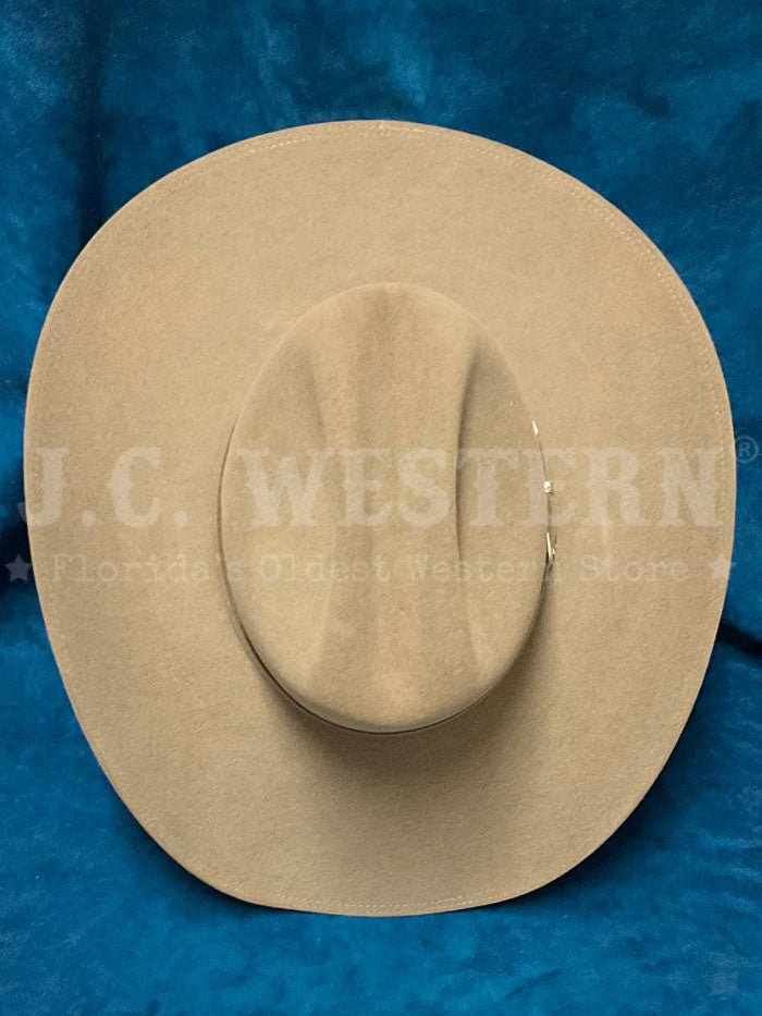 Stetson SFTRGY-754220 TRILOGY 6X Western Hat Stone side front view. If you need any assistance with this item or the purchase of this item please call us at five six one seven four eight eight eight zero one Monday through Saturday 10:00a.m EST to 8:00 p.m EST