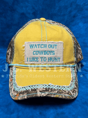 Catchfly 23204HB7 Womens Watch Out Cowboys Ponytail Ball Cap Gold and Camo front view. If you need any assistance with this item or the purchase of this item please call us at five six one seven four eight eight eight zero one Monday through Saturday 10:00a.m EST to 8:00 p.m EST