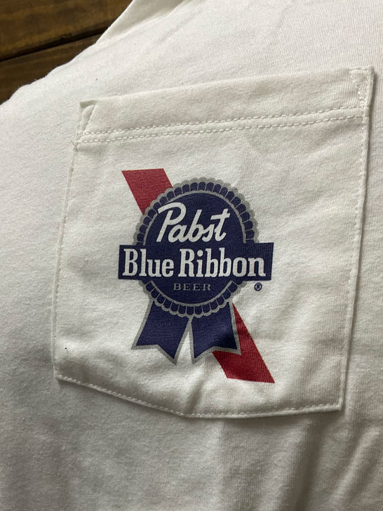 Hooey HT1703CR Mens PABST BLUE RIBBON Pocket T-Shirt Cream close up. If you need any assistance with this item or the purchase of this item please call us at five six one seven four eight eight eight zero one Monday through Saturday 10:00a.m EST to 8:00 p.m EST