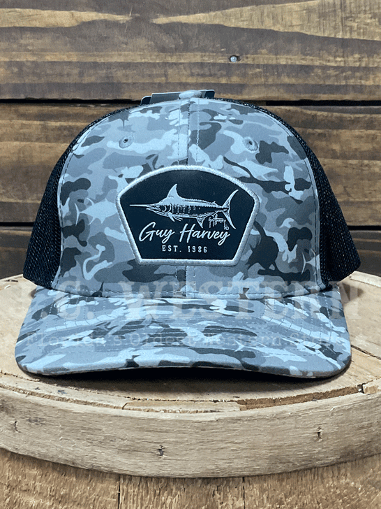 Guy Harvey GHV55789-CH Fishy Mesh Trucker Hat Camo Charcoal front. If you need any assistance with this item or the purchase of this item please call us at five six one seven four eight eight eight zero one Monday through Saturday 10:00a.m EST to 8:00 p.m EST