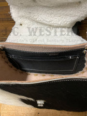 South Bay Leather WS-H Womens Hair On Saddle Purse Black And White inside view. If you need any assistance with this item or the purchase of this item please call us at five six one seven four eight eight eight zero one Monday through Saturday 10:00a.m EST to 8:00 p.m EST