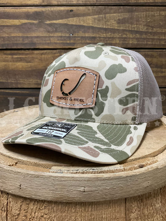 Shoot & Reel SR1-HDC Hook Cut Out Patch Curved Bill Cap Harvest Duck Camo side / front view. If you need any assistance with this item or the purchase of this item please call us at five six one seven four eight eight eight zero one Monday through Saturday 10:00a.m EST to 8:00 p.m EST