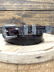 Lucchese W03106-6301-36 Custom Smooth Goat Leather Tapered Belt Black Cherry Size 36 front view rolled. If you need any assistance with this item or the purchase of this item please call us at five six one seven four eight eight eight zero one Monday through Saturday 10:00a.m EST to 8:00 p.m EST

