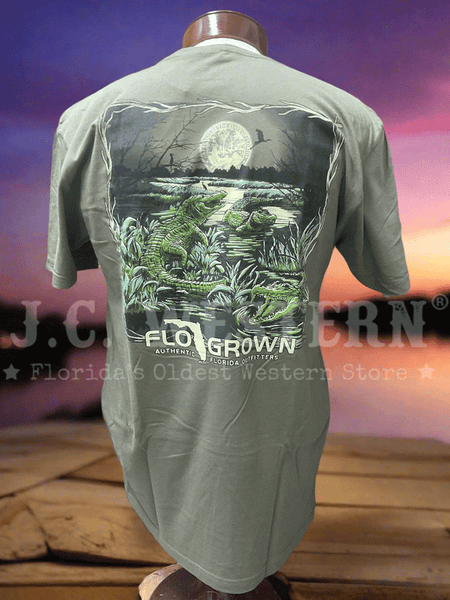 Green t-shirt with nature graphic and on a wooden surface with sunset background back view. If you need any assistance with this item or the purchase of this item please call us at five six one seven four eight eight eight zero one Monday through Saturday 10:00a.m EST to 8:00 p.m EST