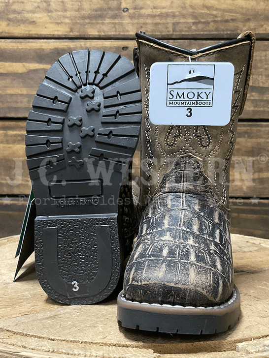 Smoky Mountain 3541T Kids Autry Western Boot Bark Brown Distressed sole and front view. If you need any assistance with this item or the purchase of this item please call us at five six one seven four eight eight eight zero one Monday through Saturday 10:00a.m EST to 8:00 p.m EST