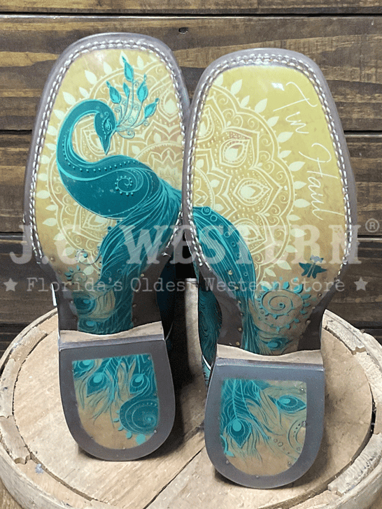 Tin Haul 14-021-0101-5003 Womens Feather Plume Peacock Sole Western Boot Tan Teal sole view. If you need any assistance with this item or the purchase of this item please call us at five six one seven four eight eight eight zero one Monday through Saturday 10:00a.m EST to 8:00 p.m EST