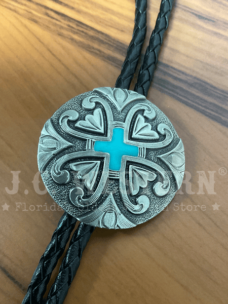 Fashionwest 2427 Round Concho With Cross Western Bolo Tie Turquoise close up. If you need any assistance with this item or the purchase of this item please call us at five six one seven four eight eight eight zero one Monday through Saturday 10:00a.m EST to 8:00 p.m EST