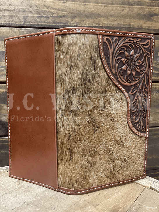 Nocona N500045502 Mens Calf Hair Tooled Tab Rodeo Wallet Brown outside view. If you need any assistance with this item or the purchase of this item please call us at five six one seven four eight eight eight zero one Monday through Saturday 10:00a.m EST to 8:00 p.m EST