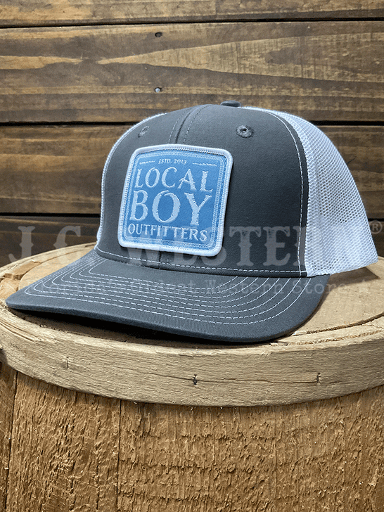 Local Boy Outfitters L3000381-CHW Shipwreck Trucker Hat Charcoal White side / front view. If you need any assistance with this item or the purchase of this item please call us at five six one seven four eight eight eight zero one Monday through Saturday 10:00a.m EST to 8:00 p.m EST