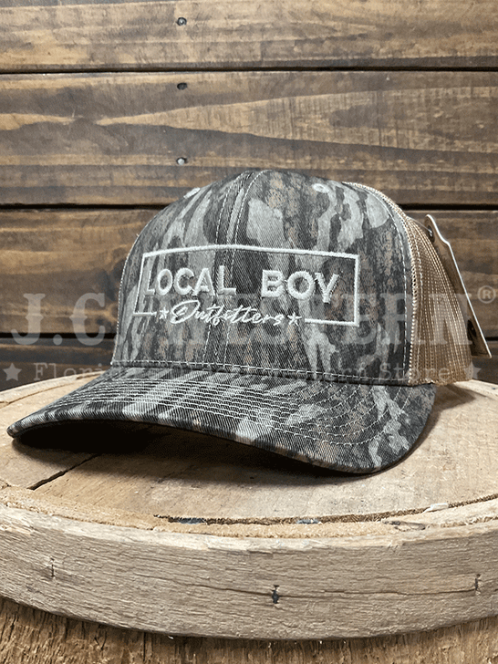 Local Boy Outfitters L3000374-BLD Broadway Trucker Hat Bottomland side / front view. If you need any assistance with this item or the purchase of this item please call us at five six one seven four eight eight eight zero one Monday through Saturday 10:00a.m EST to 8:00 p.m EST