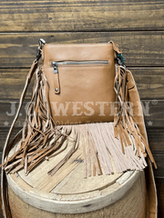 Montana West RLC-L186BR Womens Genuine Leather Hair On Fringe Crossbody Brown back view. If you need any assistance with this item or the purchase of this item please call us at five six one seven four eight eight eight zero one Monday through Saturday 10:00a.m EST to 8:00 p.m EST
