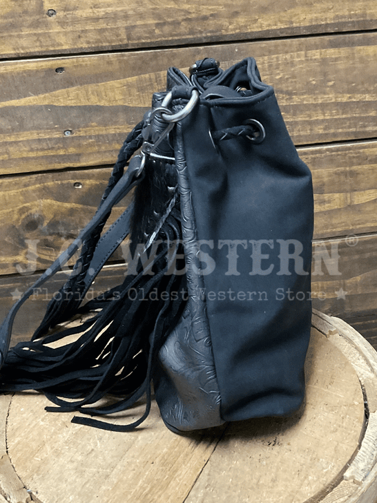 Montana West MW1349-8311BK Womens Hair On Cowhide Drawstring Crossbody Bucket Bag Black side view. If you need any assistance with this item or the purchase of this item please call us at five six one seven four eight eight eight zero one Monday through Saturday 10:00a.m EST to 8:00 p.m EST