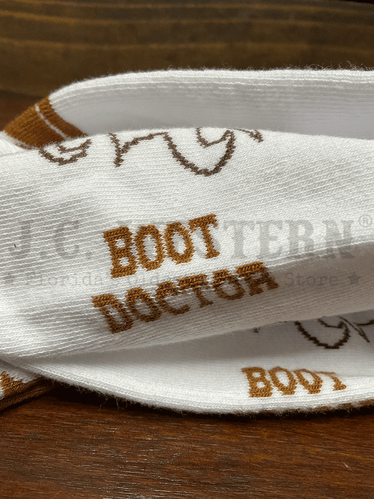 Boot Doctor 0422308 Ladies Over The Calf Boot Stitch Socks Tan And White close up. If you need any assistance with this item or the purchase of this item please call us at five six one seven four eight eight eight zero one Monday through Saturday 10:00a.m EST to 8:00 p.m EST