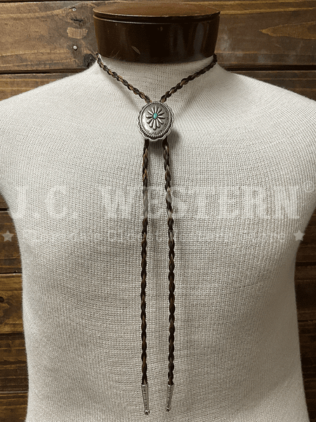 Cowboy Collectibles BOLT513 Iconic Turquoise Bolo Tie Granite And Black front view. front view. If you need any assistance with this item or the purchase of this item please call us at five six one seven four eight eight eight zero one Monday through Saturday 10:00a.m EST to 8:00 p.m EST