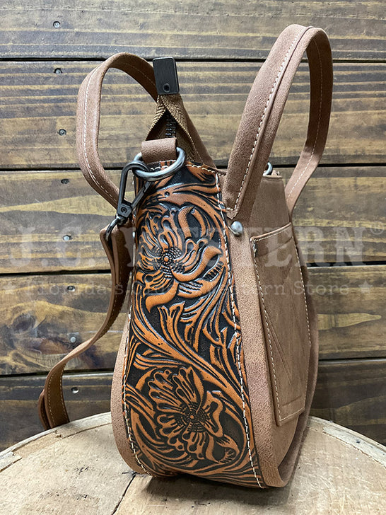 Wrangler WG169-2022BR Womens Genuine Hair On Cowhide Tote/Crossbody Bag Brown side view. If you need any assistance with this item or the purchase of this item please call us at five six one seven four eight eight eight zero one Monday through Saturday 10:00a.m EST to 8:00 p.m EST