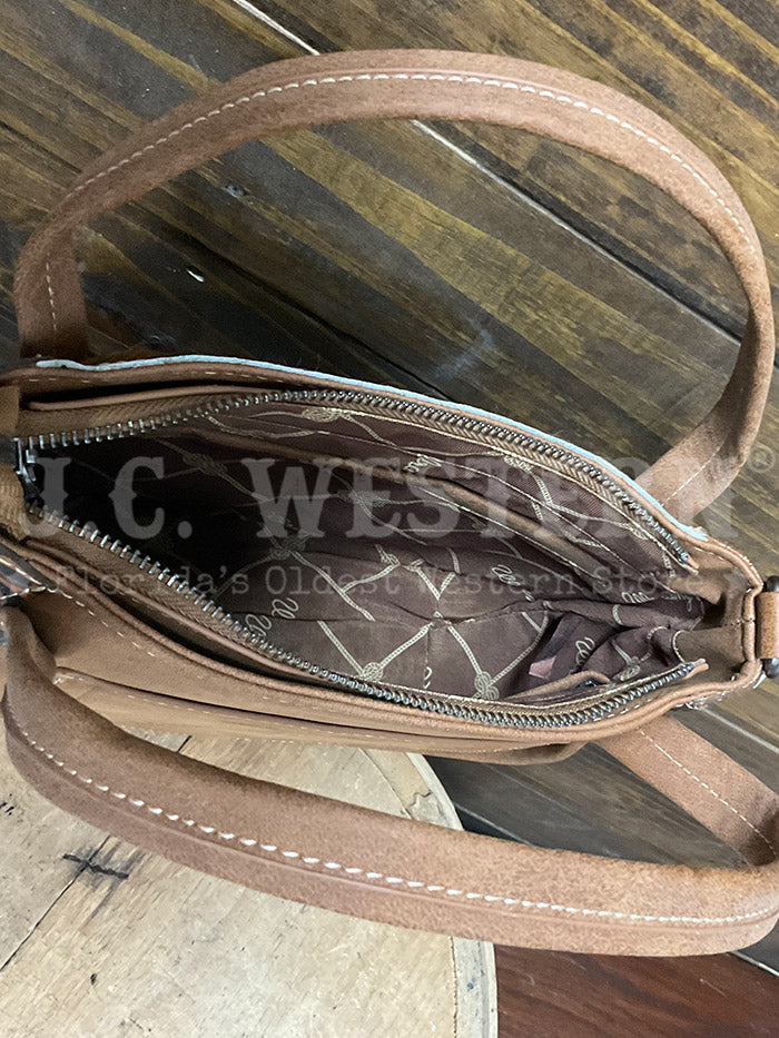 Wrangler WG169-2022BR Womens Genuine Hair On Cowhide Tote/Crossbody Bag Brown front view. If you need any assistance with this item or the purchase of this item please call us at five six one seven four eight eight eight zero one Monday through Saturday 10:00a.m EST to 8:00 p.m EST