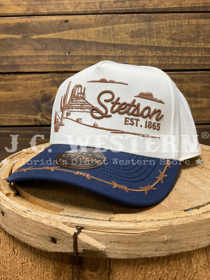 Stetson SCLHA-0006 Landscape Trucker Hat Navy Ivory front view. If you need any assistance with this item or the purchase of this item please call us at five six one seven four eight eight eight zero one Monday through Saturday 10:00a.m EST to 8:00 p.m EST
