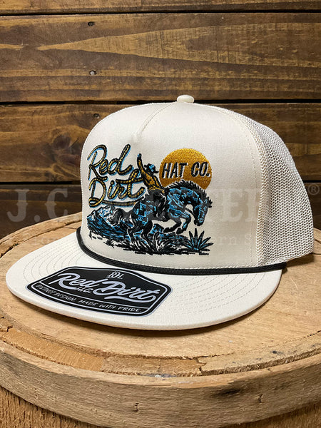 An off-white trucker hat with a mesh back, featuring a graphic of a cowboy on a blue horse and the text 'Red Dirt HAT CO.' on the front.If you need any assistance with this item or the purchase of this item please call us at five six one seven four eight eight eight zero one Monday through Saturday 10:00a.m EST to 8:00 p.m EST