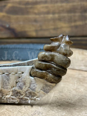 Skin Shop 160Rattle Genuine Rattlesnake Head Hatband Natural close up. If you need any assistance with this item or the purchase of this item please call us at five six one seven four eight eight eight zero one Monday through Saturday 10:00a.m EST to 8:00 p.m EST