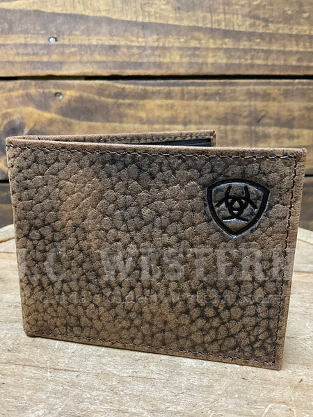 Ariat A3547602 Mens Bifold Shield Logo Wallet Brown front view. If you need any assistance with this item or the purchase of this item please call us at five six one seven four eight eight eight zero one Monday through Saturday 10:00a.m EST to 8:00 p.m EST