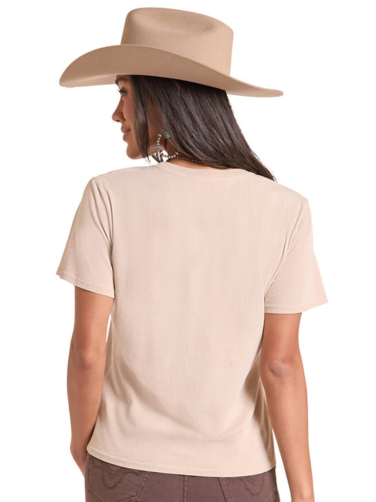 A woman shown from the back wearing a light beige short-sleeve crewneck t-shirt and a matching beige wide-brim cowboy hat against a plain white background. If you need any assistance with this item or the purchase of this item please call us at five six one seven four eight eight eight zero one Monday through Saturday 10:00a.m EST to 8:00 p.m EST